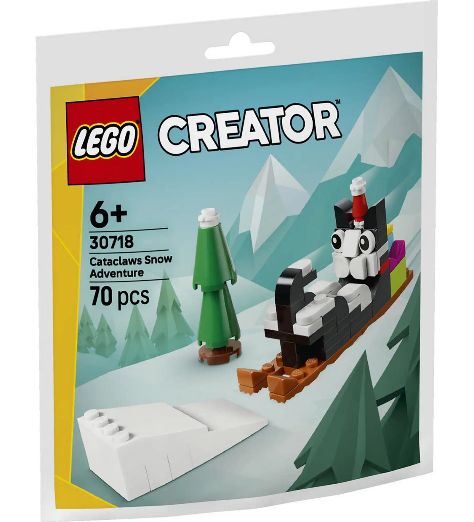 LEGO Creator Cataclaws Snow Adventure (30718) polybag csomagolás, amelyen egy fekete-fehér macska látható szánkón ülve, mikulássapkában, havas hegyvidéki háttér előtt.