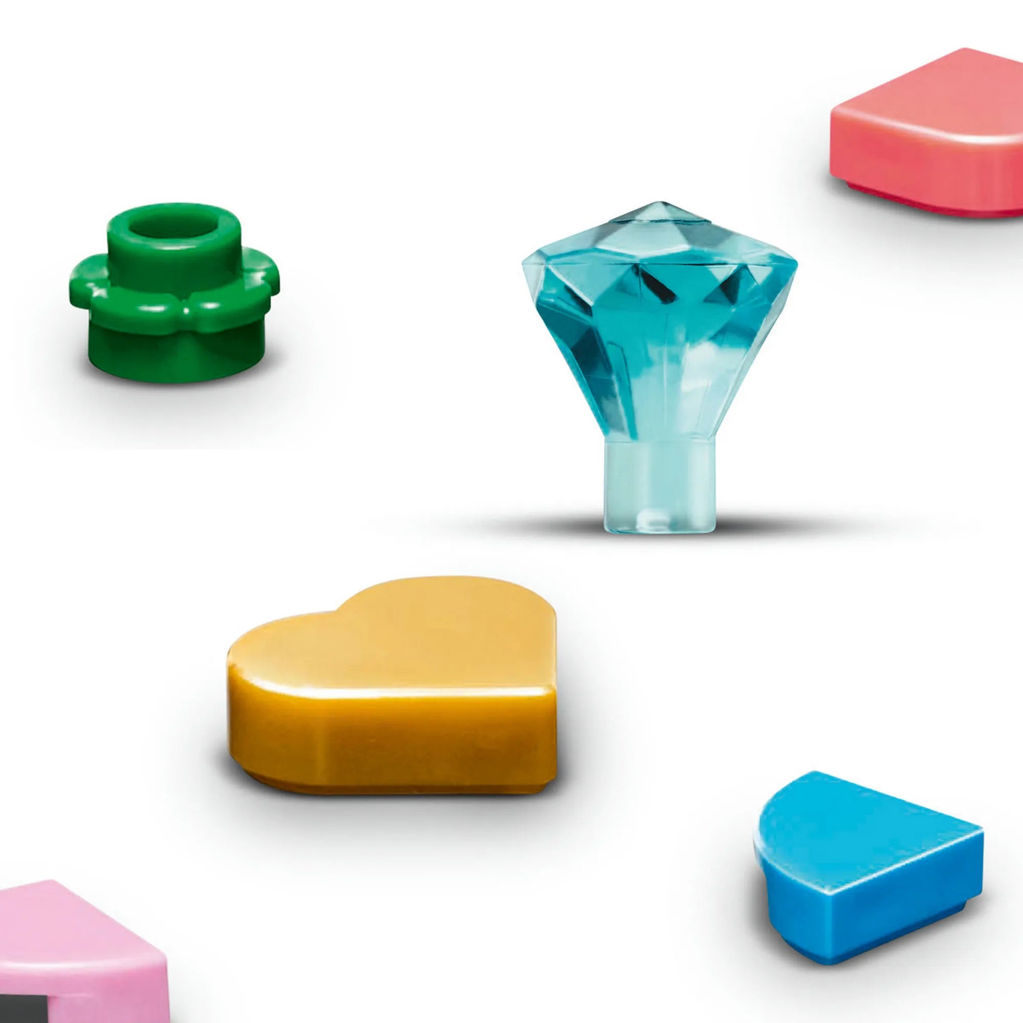 LEGO Dekoratív húsvéti tojás 40816 – Színes LEGO díszítőelemek és áttetsző gyémánt formájú kockák fehér háttéren.