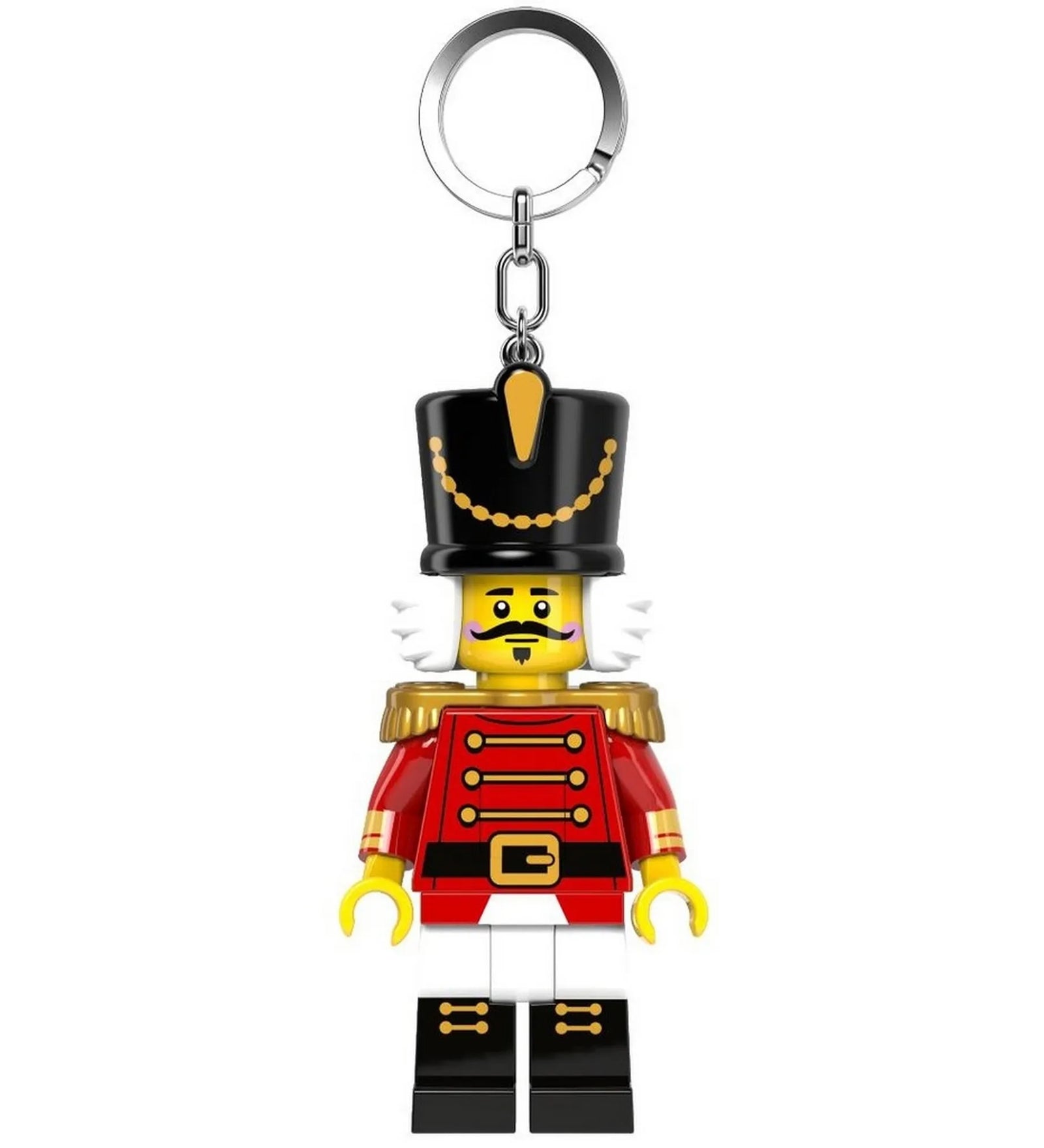 A LEGO Diótörő minifigura alakú kulcstartó elölről látható, piros díszruhában, fekete magas sapkával és arany vállpántokkal.