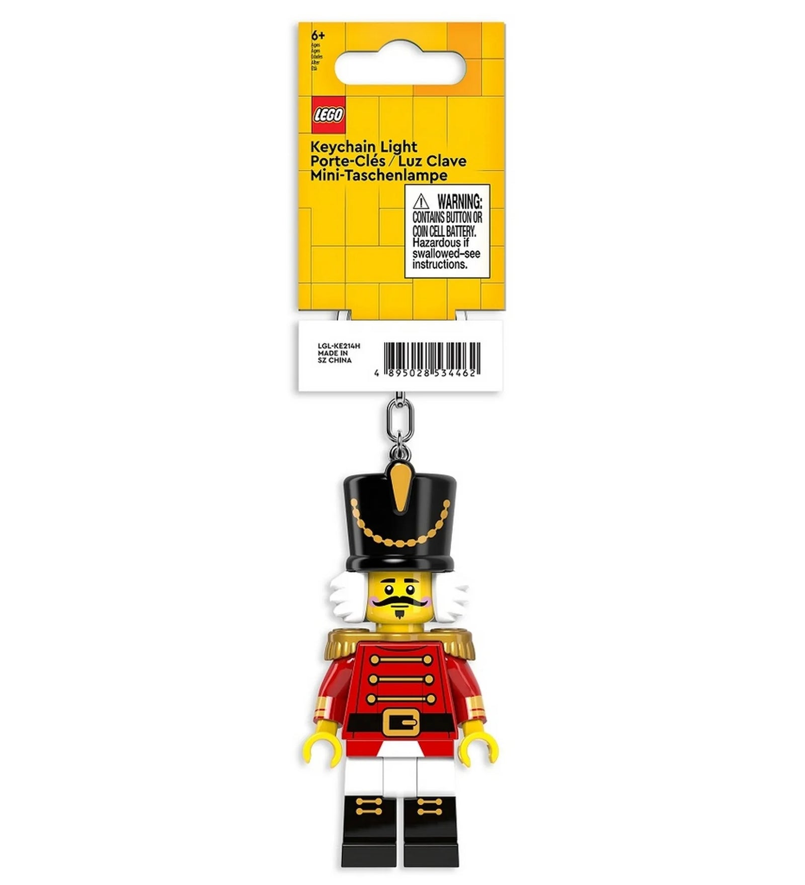 A LEGO Diótörő LED kulcstartó sárga csomagolásban látható, a LEGO logóval és többnyelvű felirattal ellátva.