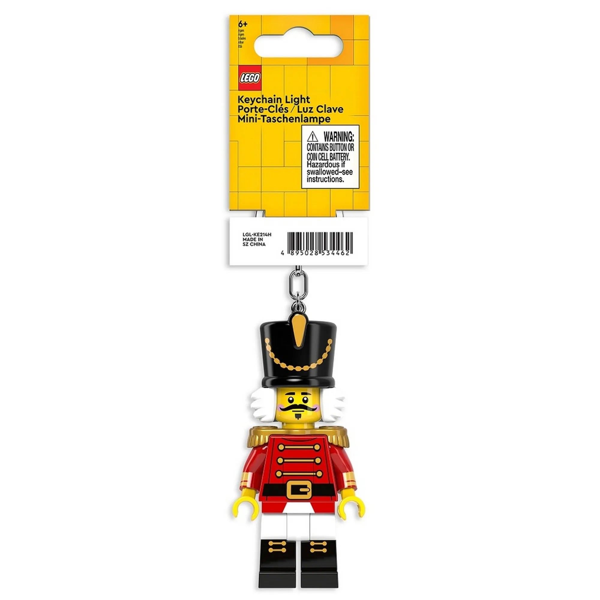 A LEGO Diótörő LED kulcstartó sárga csomagolásban látható, a LEGO logóval és többnyelvű felirattal ellátva.