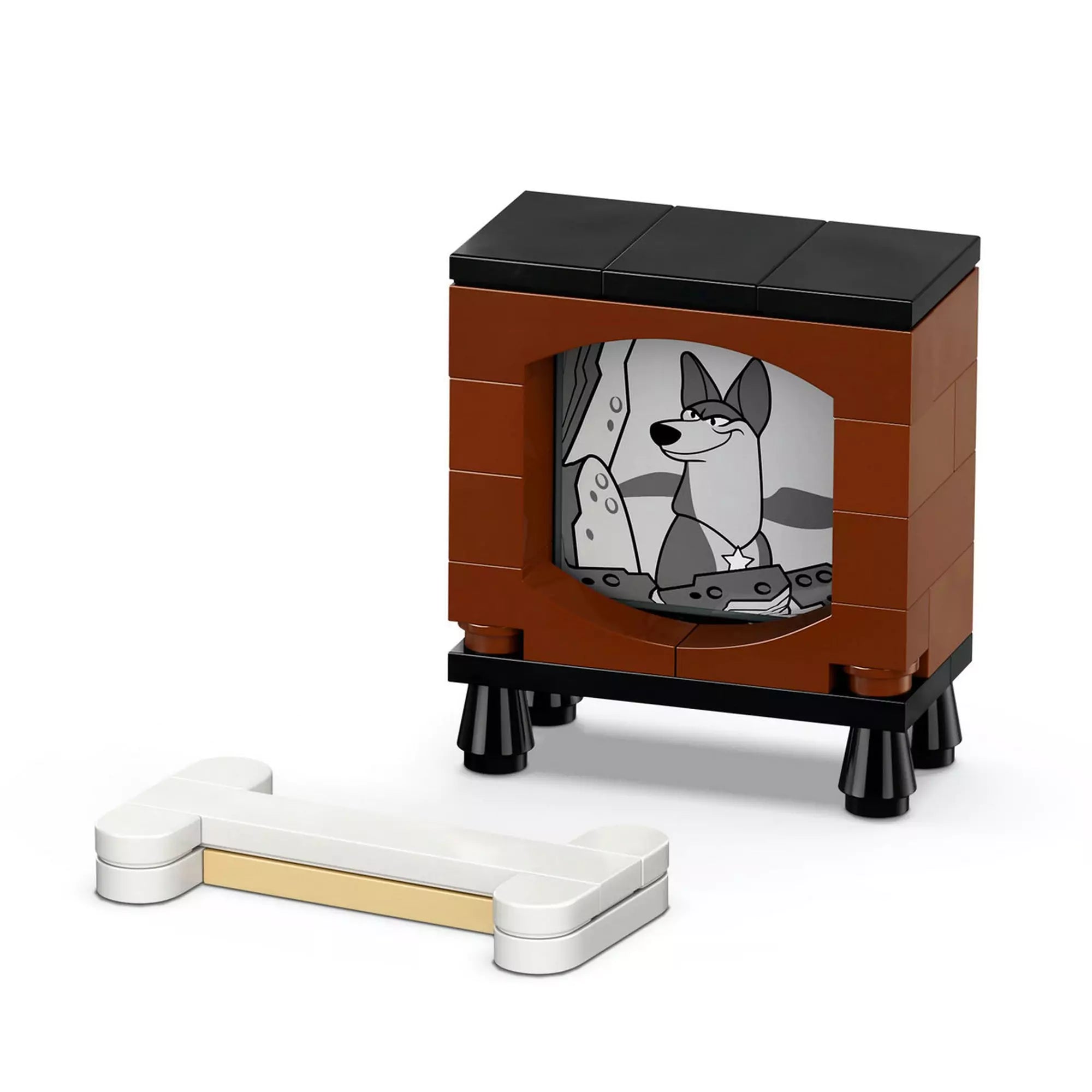 LEGO Disney Lucky és Penny kiskutyák (43271) szett része, egy barna retro televízió és egy LEGO csont.