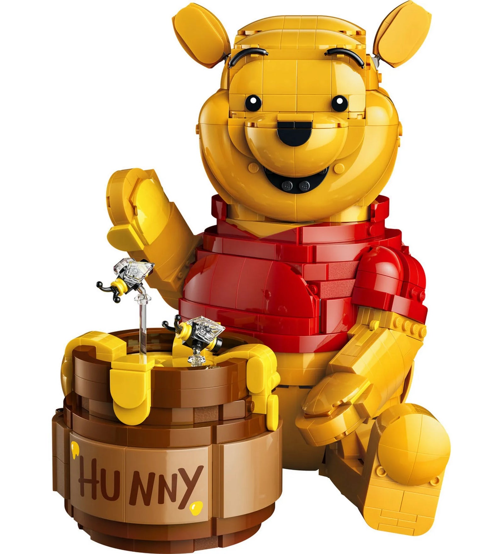 LEGO Disney Micimackó épített figura mézescsuporral és méhecskékkel, klasszikus Micimackó modell piros pólóban.
