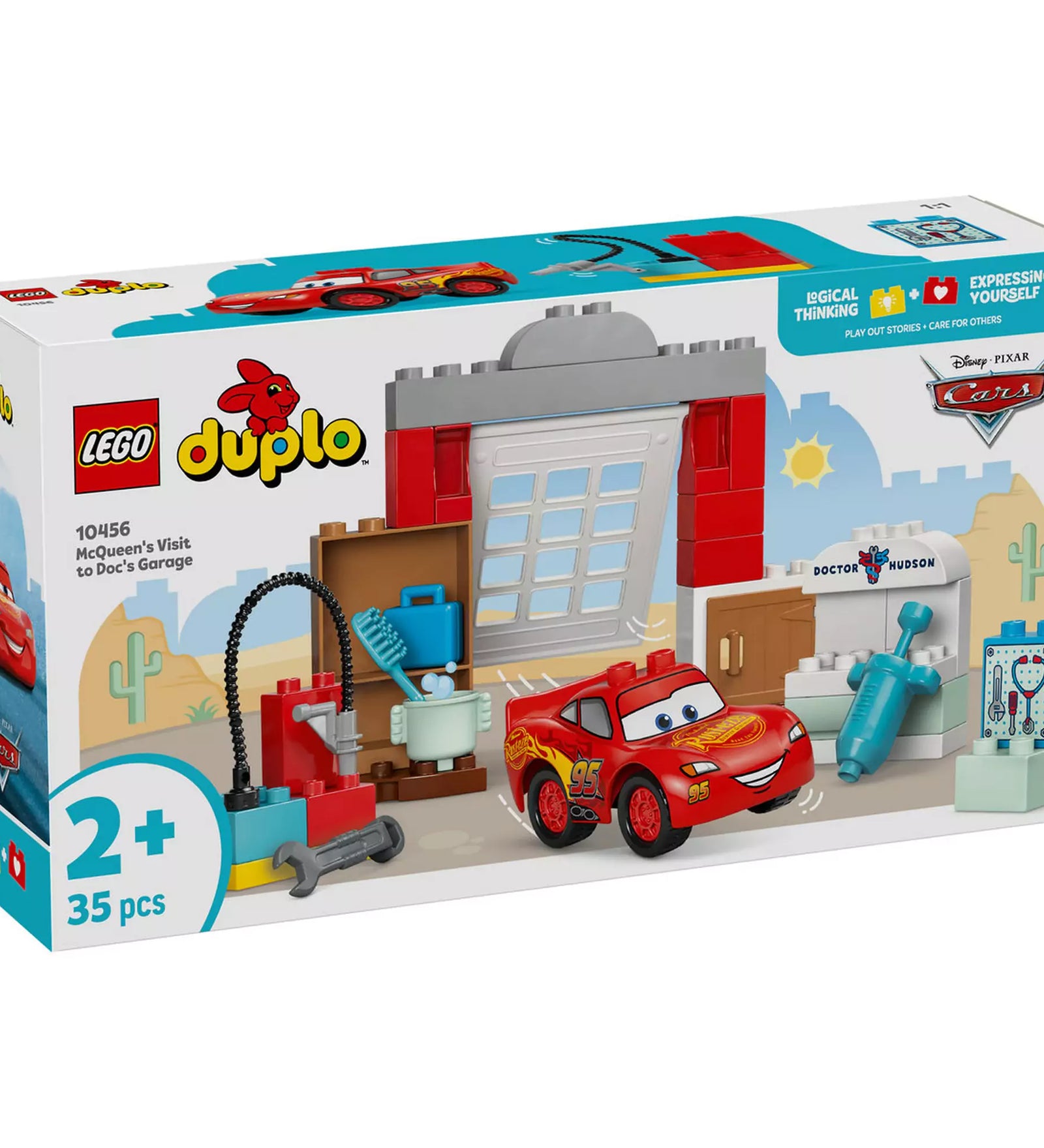  A LEGO DUPLO McQueen látogatása Doc garázsában (10456) dobozának előlapja, rajta a szerelhető garázsépület, Villám McQueen figura és különböző szerelőeszközök.