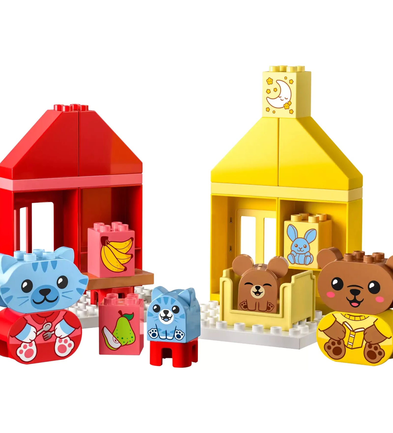 LEGO Duplo Napi rutin szett összeépítve – A LEGO Duplo 10414 készlet két házikóval, macska- és medvefigurákkal, valamint gyümölcsöt ábrázoló elemekkel berendezve.