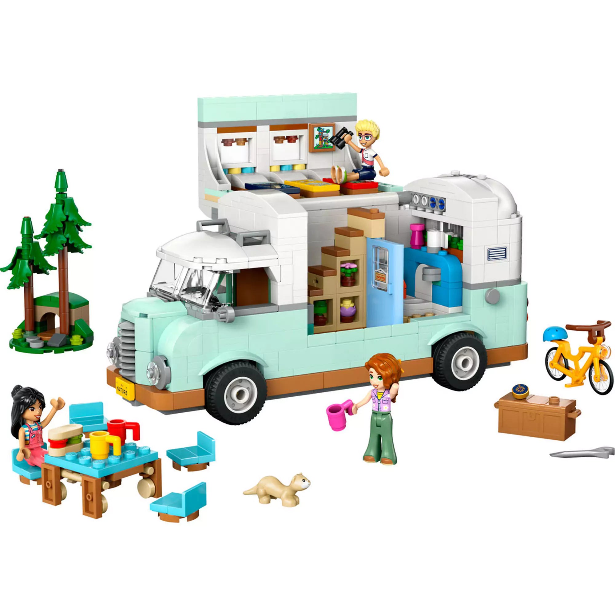 LEGO Friends: Barátság lakóautós kaland (42663) készlet teljes tartalma, beleértve a nyitott lakóautót, piknikasztalt, biciklit, fát és minifigurákat.