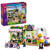 LEGO Friends Kreatív virágbolt 42693 készlet doboza az elkészült virágüzlettel, tandemkerékpárral és virágos dekorációval.