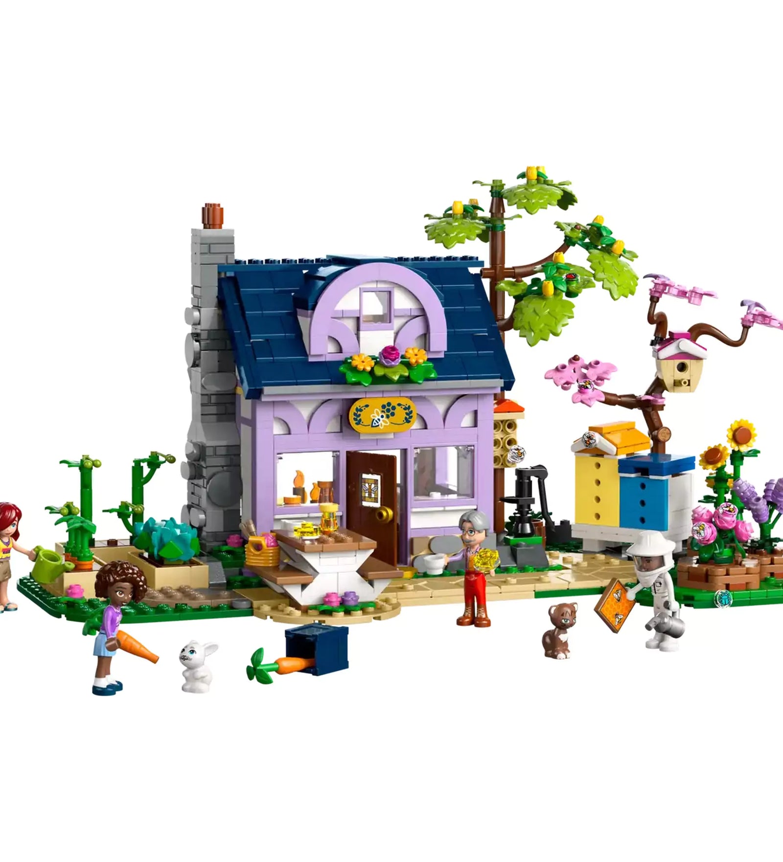 Teljes modell LEGO Friends Méhészek háza és virágoskert 42669, színes virágokkal és méhészkedős részletekkel.