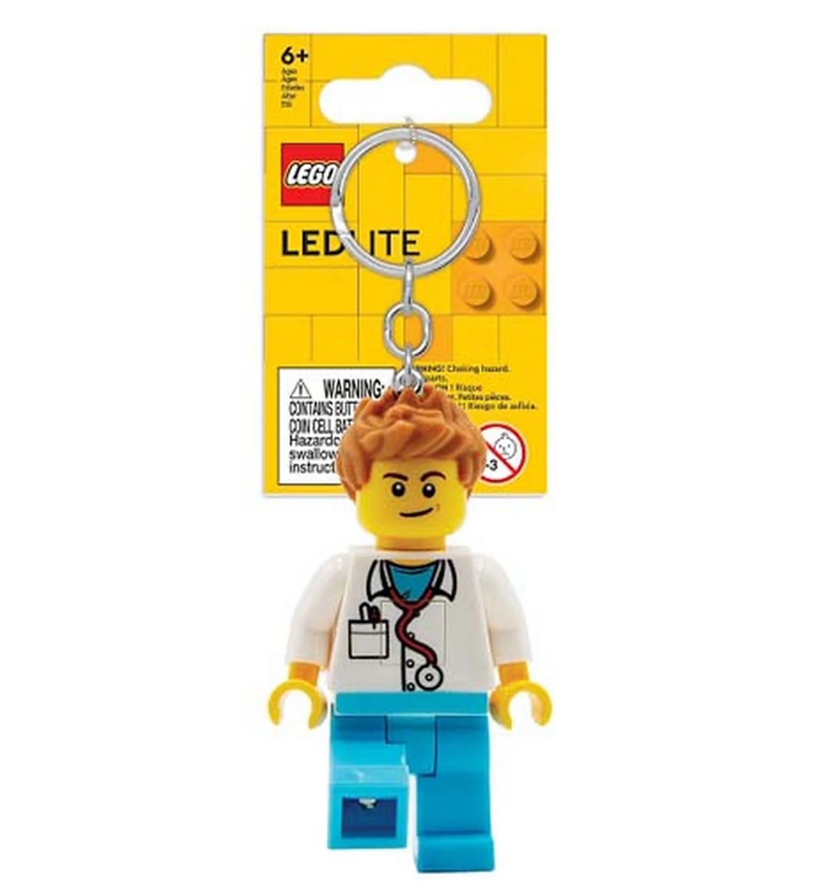 LEGO Iconic LED kulcstartó férfi orvos minifigurával. A figurán fehér orvosi köpeny, sztetoszkóp és világoskék nadrág látható. A lábakban LED fény található, a mellkason lévő gombbal aktiválható. Ideális kulcstartó vagy táskadísz LEGO-rajongóknak.