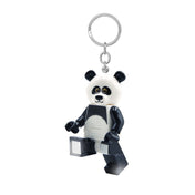 LEGO Panda LED-es kulcstartó oldalnézetben, felemelt lábbal, bekapcsolt LED világítással.