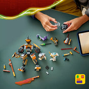 A LEGO Builder alkalmazás használata a Cole’s Mission Mech építése során, szétszórt alkatrészekkel az asztalon.