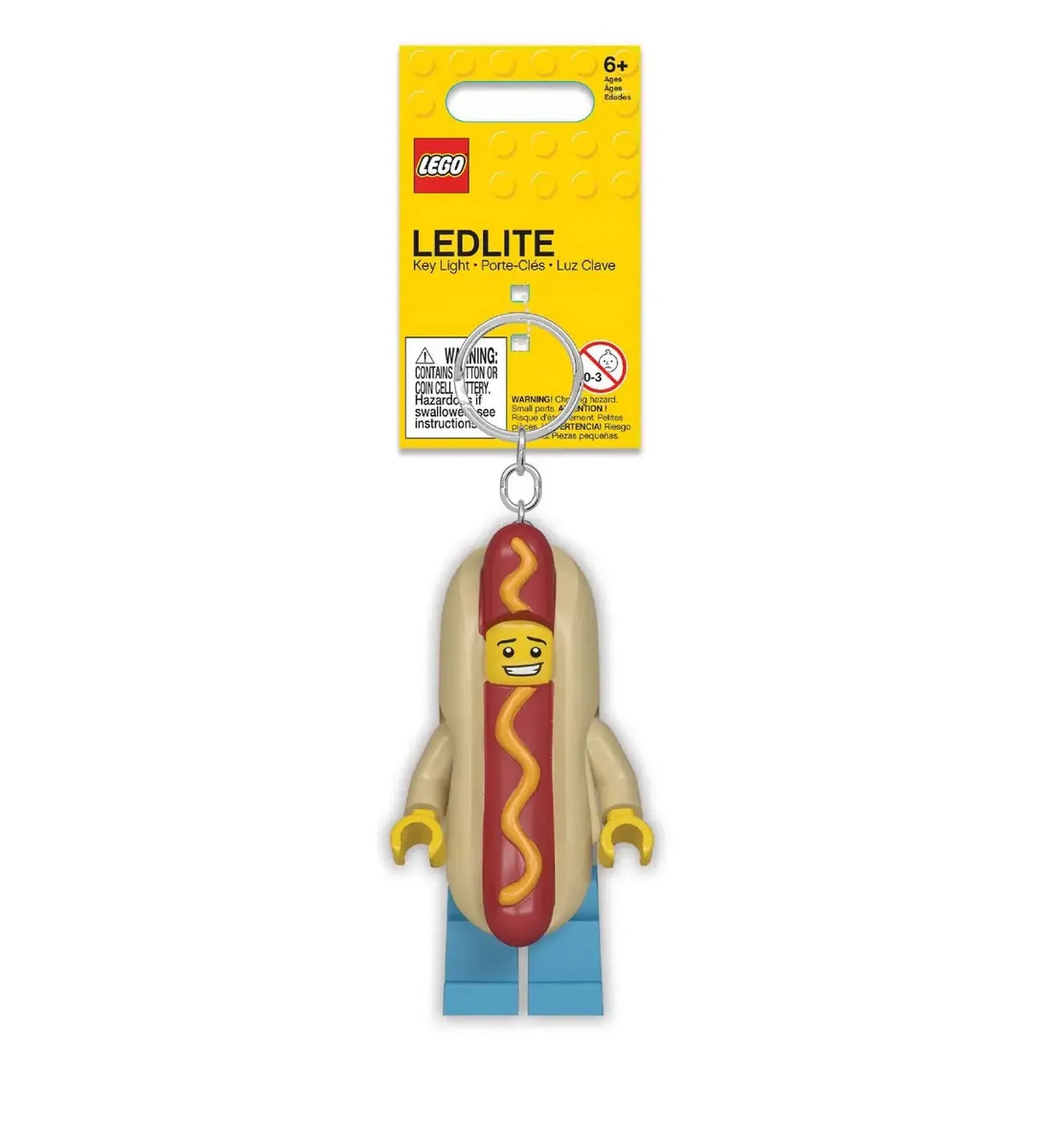 A LEGO világító kulcstartó Hot Dog figura dobozos kiszerelésben. Sárga LEGO csomagolás, láncon lógó minifigura formájú kulcstartó LED-es világítással.

