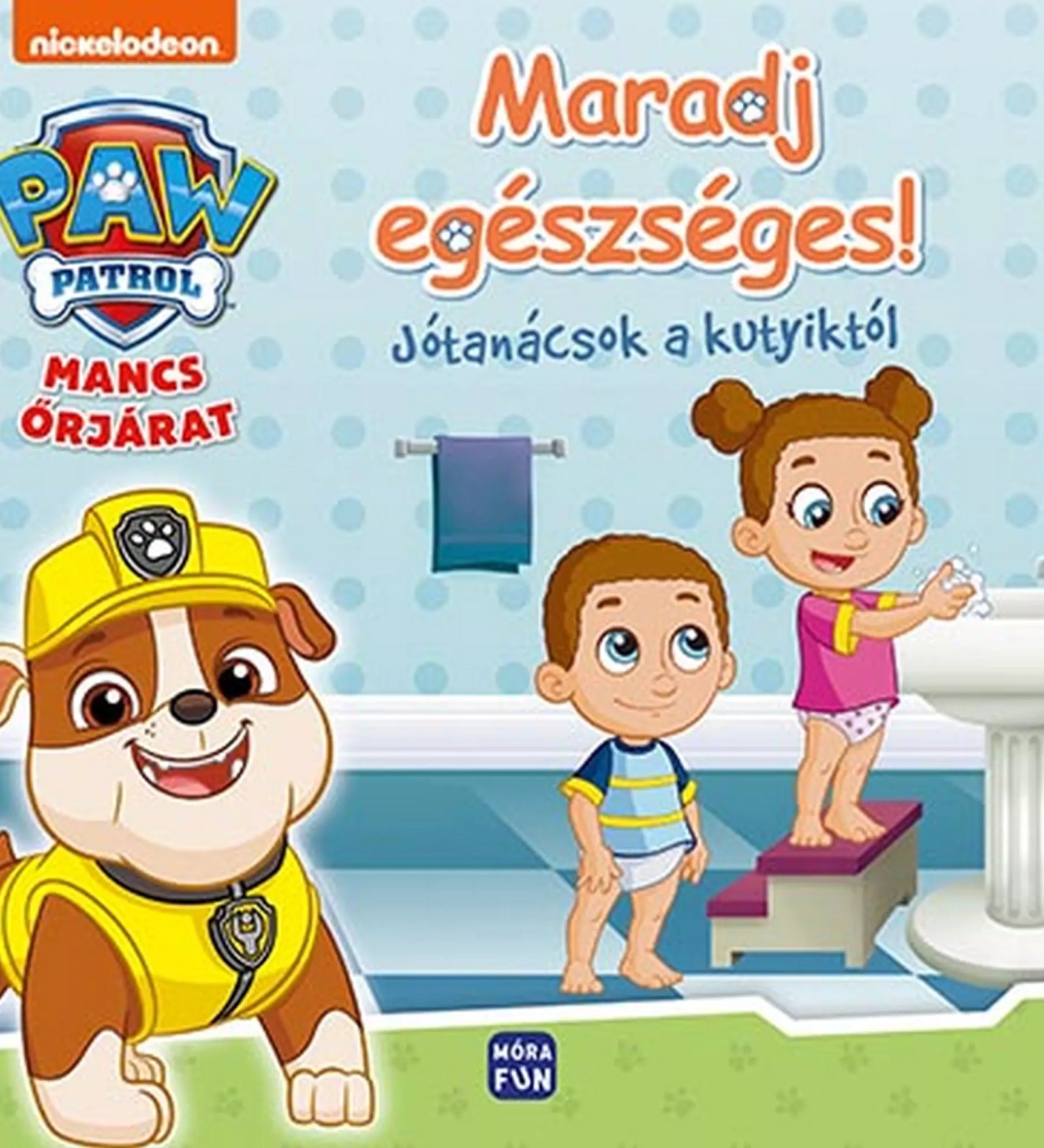„Maradj egészséges! – Jótanácsok a kutyiktól” című Mancs Őrjárat könyv borítója, amelyen Rubble kutya mosolyog, mellette egy kisfiú és egy kislány látható, amint kézmosást gyakorolnak a fürdőszobában.