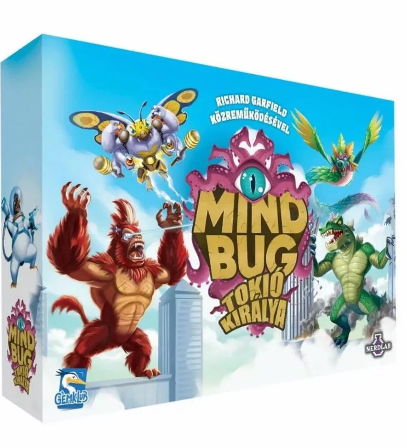 Mindbug x Tokió Királya társasjáték dobozképe, színes illusztrációval, ahol kaidzsú szörnyek csapnak össze Tokió felhőkarcolói felett, Mindbug logóval és Gemklub kiadói jelzéssel.