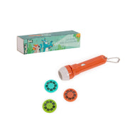 Moulin Roty Dzsungel mesefény kivetítő narancssárga lámpával és három színes vetítőtárcsával a doboz mellett.