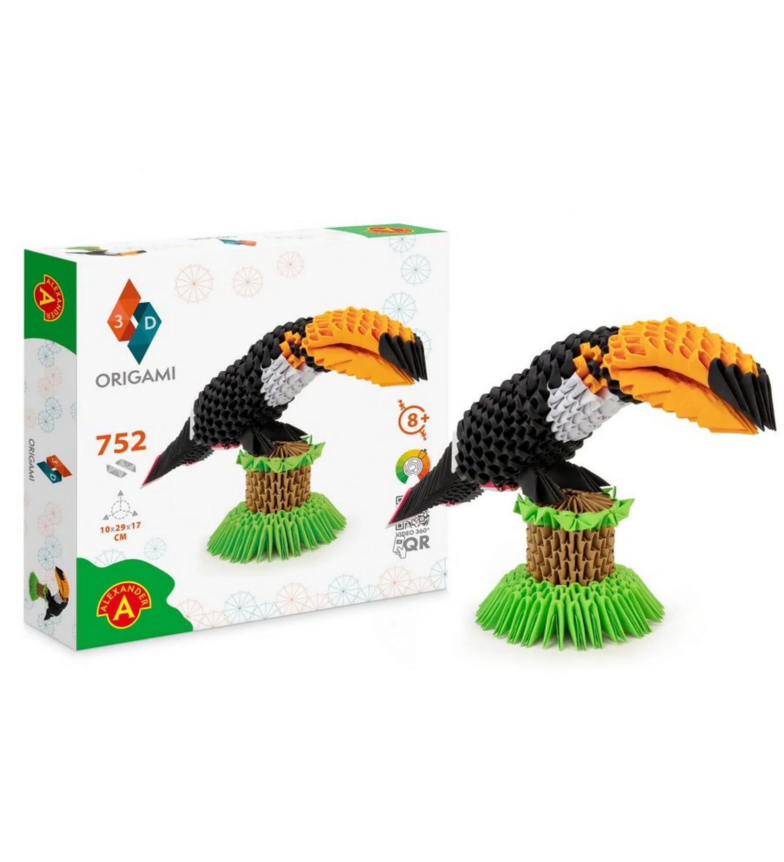 Az Origami 3D Tukán készlet kibontott változata, rajta a kész, háromdimenziós tukán papírfigura és a csomagolás. A tukán élénk narancs csőre és fekete teste részletesen kidolgozott, zöld talapzaton áll.
