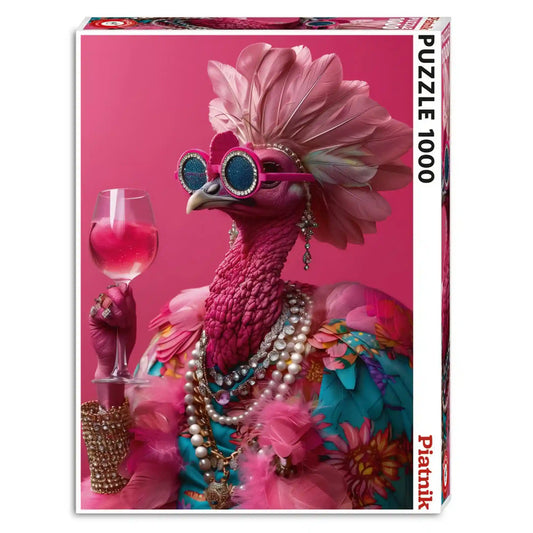 Piatnik Pink Birdie 1000 darabos puzzle dobozképe, extravagáns rózsaszín madárral, csillogó napszemüvegben, gyöngyékszerekkel és elegáns kiegészítőkkel, élénk pink háttér előtt.