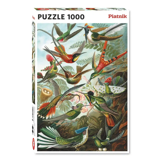 Piatnik Hummingbirds - Ernst Haeckel 1000 darabos puzzle dobozképe, amely színpompás kolibriket és trópusi növényeket ábrázoló művészi illusztrációt mutat.