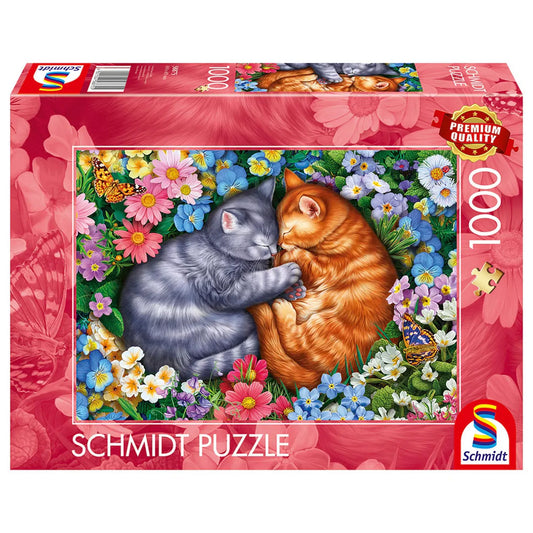 Schmidt Puzzle 1000 darabos kirakó doboza, két összebújó alvó cicával, színes virágokkal és pillangókkal, romantikus hangulatú illusztrációval