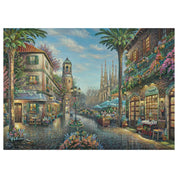 Puzzle Schmidt: Thomas Kinkade – Spanyol kávézó – gyönyörű mediterrán városrészlet éttermekkel, virágokkal és a háttérben a Sagrada Famíliával.