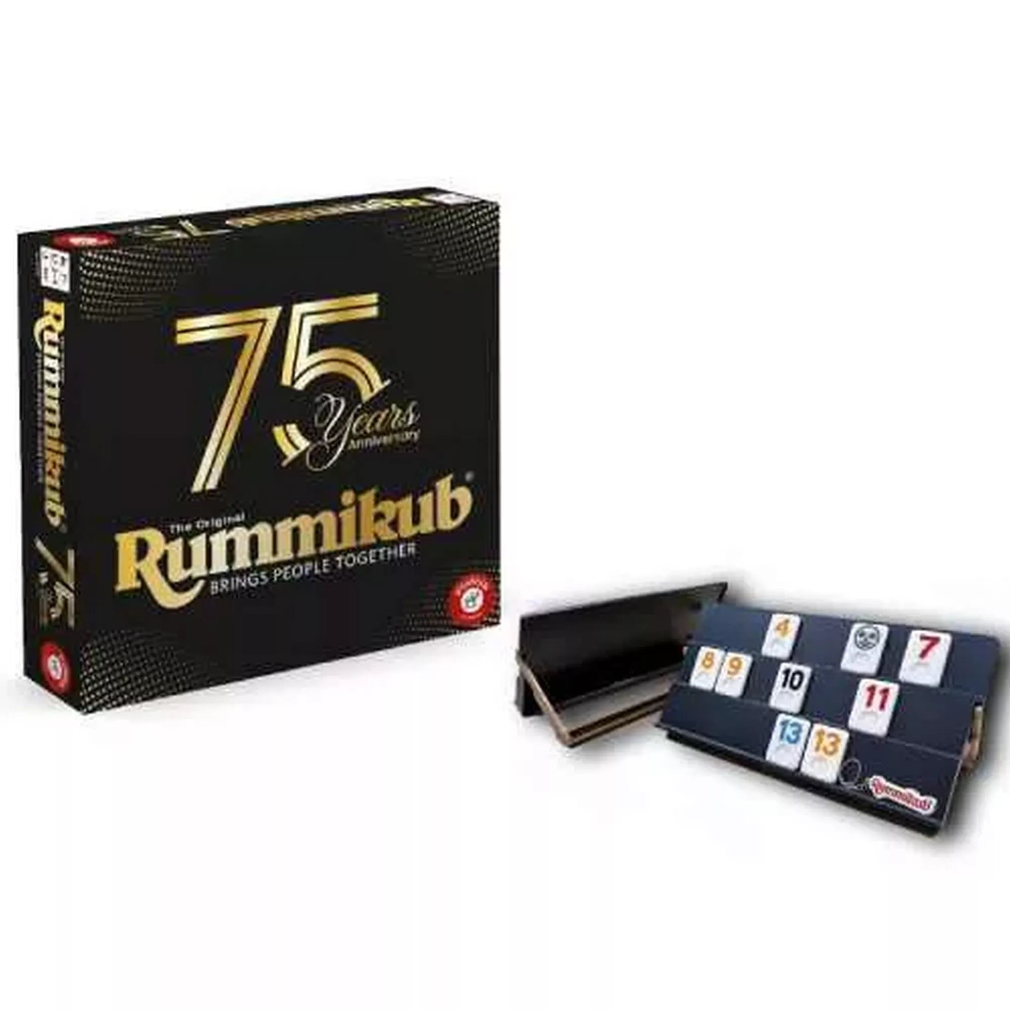 Rummikub 75. évfordulós társasjáték doboza és játékelemek, prémium állványokkal és számlapkákkal, elegáns fekete-arany csomagolásban