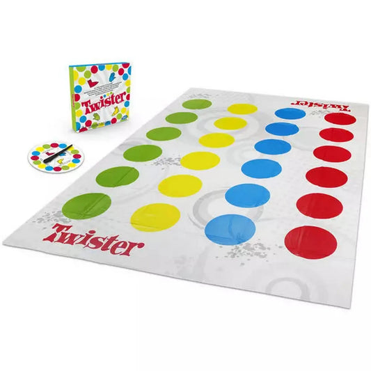 A Twister játék teljes készlete: színes pöttyös játékmező, pörgető és a doboz egymás mellett.