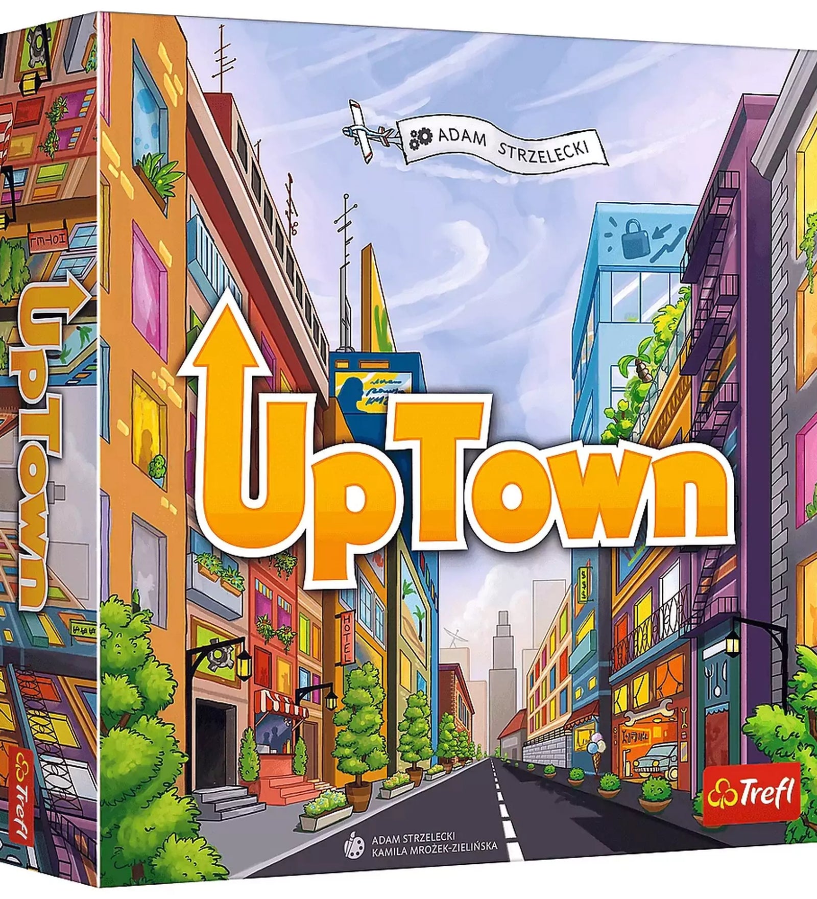 UpTown társasjáték doboza színes, városi illusztrációval, magas épületekkel és felhők között repülő reklámszalagos repülőgéppel.