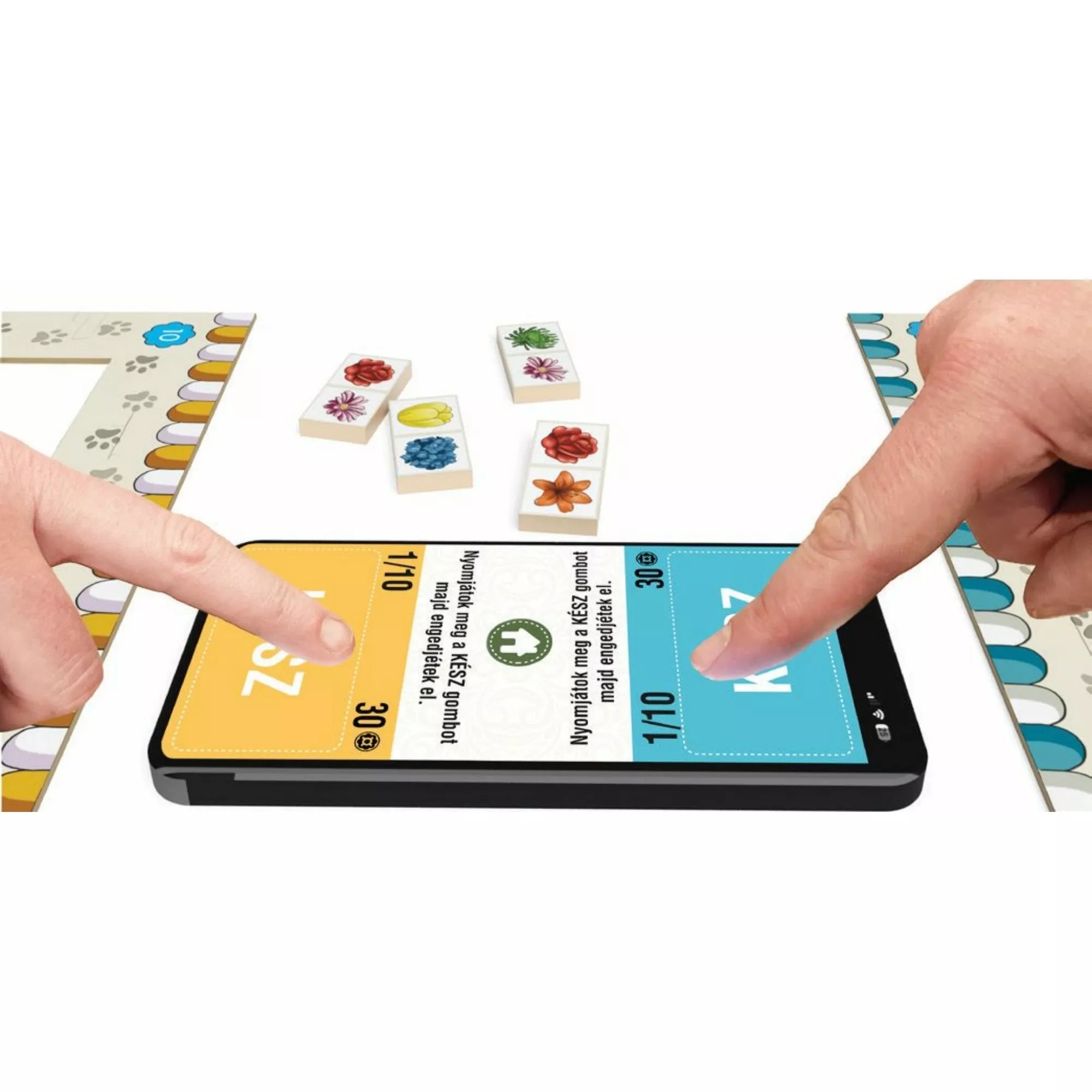 A Virágvásár játék közben, két játékos egyszerre érinti a mobilalkalmazás kijelzőjét, amely a holland aukció menetét vezeti. A képen virágos lapkák és játéktáblák is láthatók a háttérben.